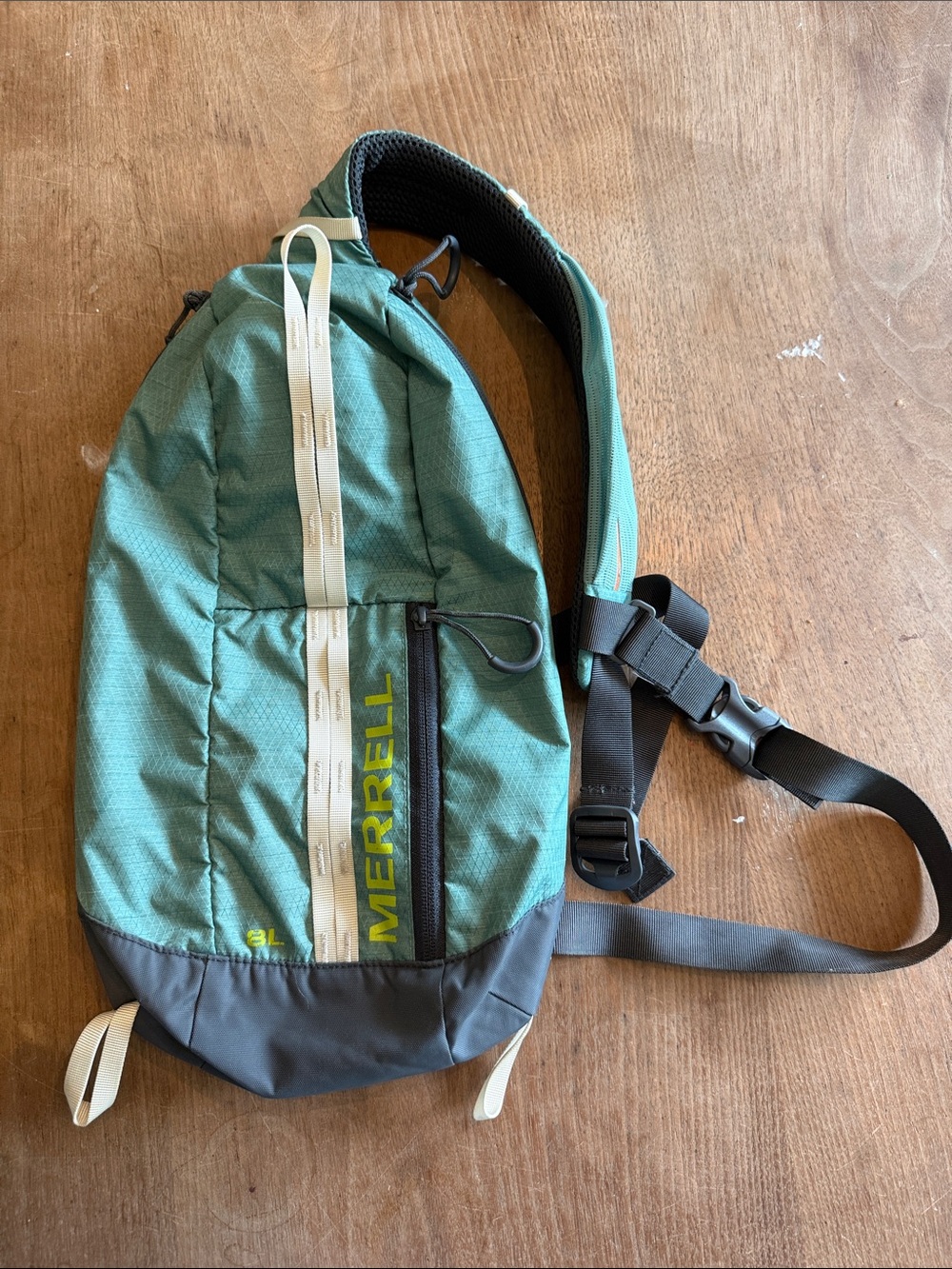 Merrell 8L Teal and Gray Crossbody Sling Bag with Cream Accent